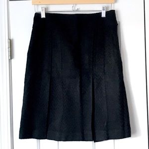 Versai black tweed box pleat skirt